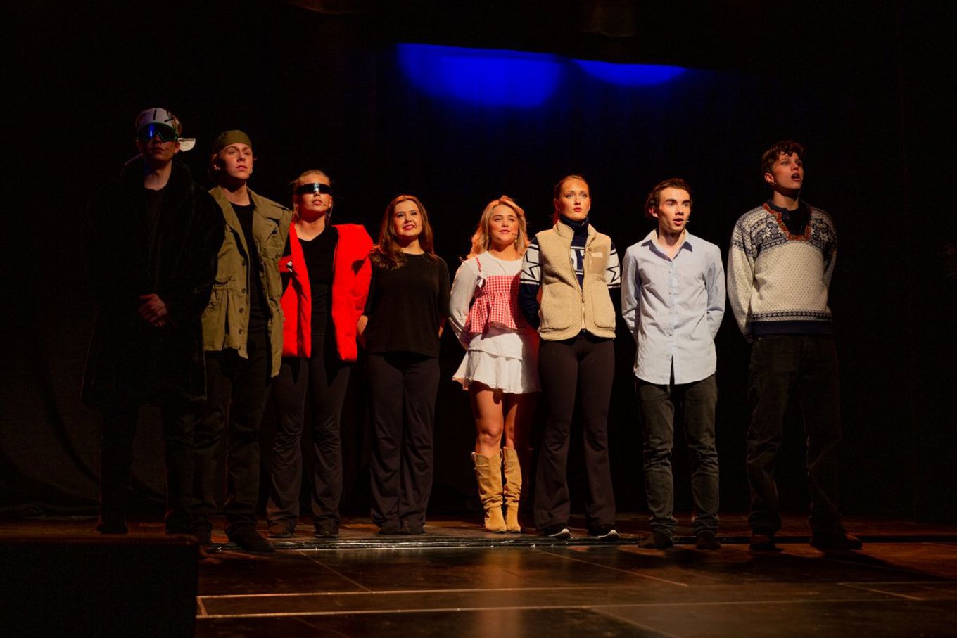 a group of people posing for a photo